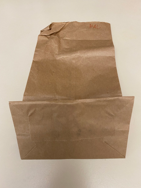 photo of a paper bag with boyfriend's name on it