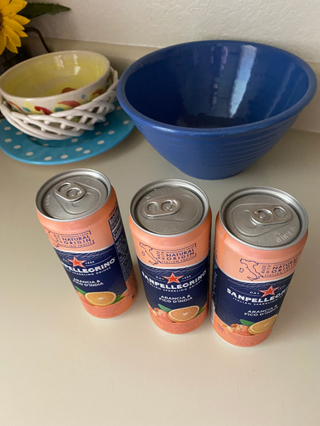 photo of three cans of Pelligrino beverage