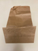 photo of paper bag with boyfrien's name on it